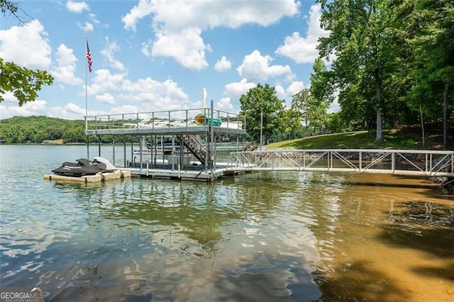 view of dock with a water view