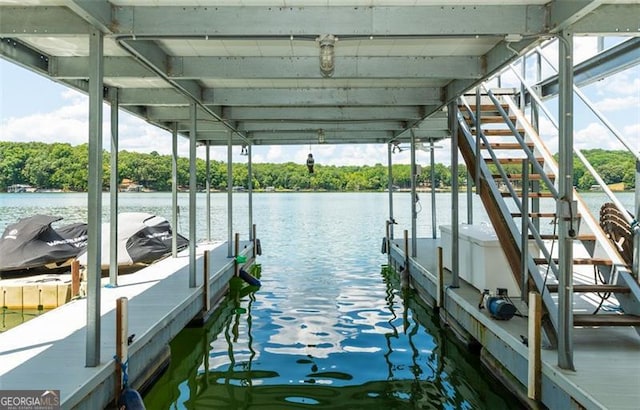 dock area featuring a water view