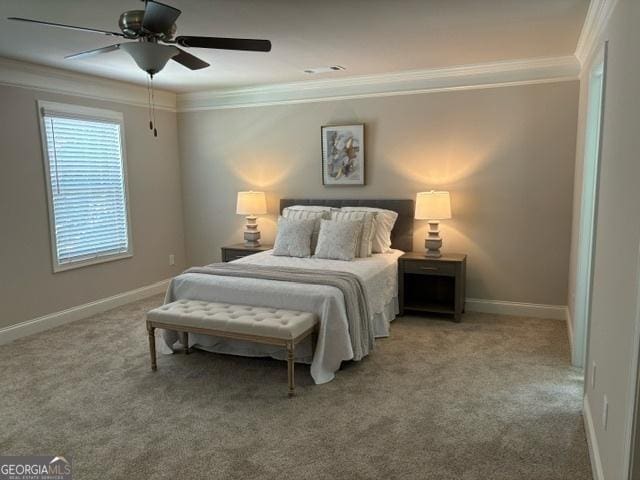 bedroom featuring ceiling fan, ornamental molding, and carpet