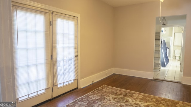 interior space with dark wood-type flooring