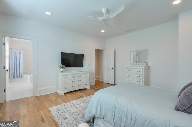 bedroom with ceiling fan and light wood-type flooring