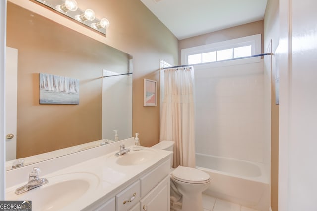 full bathroom with shower / tub combo with curtain, vanity, tile patterned flooring, and toilet