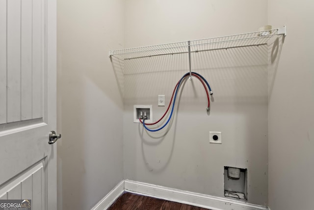 laundry room featuring dark wood-type flooring, hookup for an electric dryer, and hookup for a washing machine