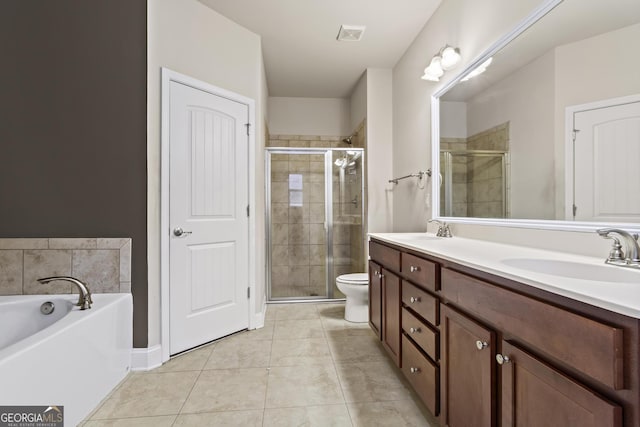 full bathroom featuring tile patterned floors, toilet, independent shower and bath, and vanity