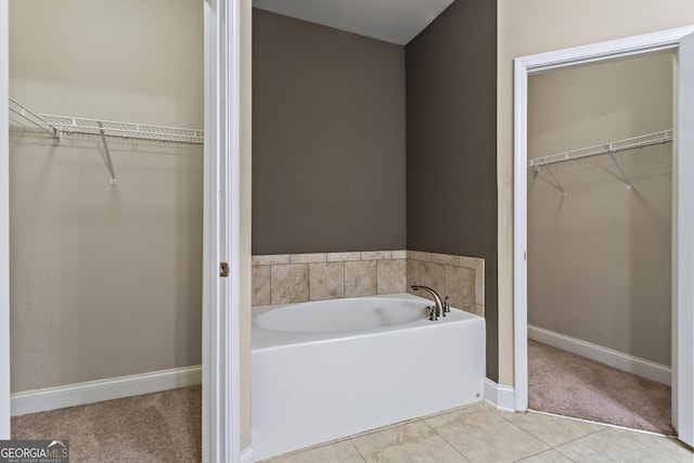 bathroom featuring a tub and tile patterned floors