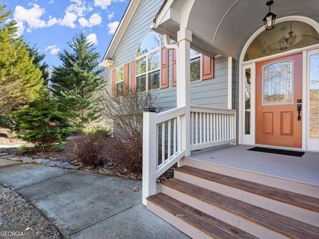 doorway to property with a porch