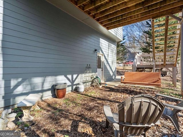 view of yard featuring a wooden deck