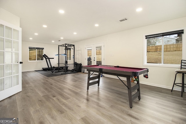 game room featuring wood-type flooring, pool table, and french doors