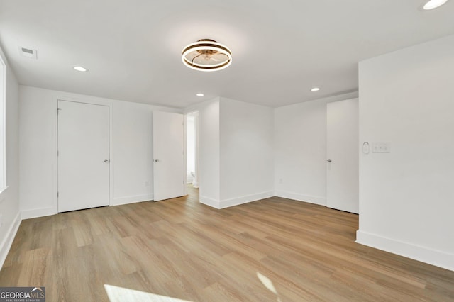 unfurnished bedroom with light hardwood / wood-style floors