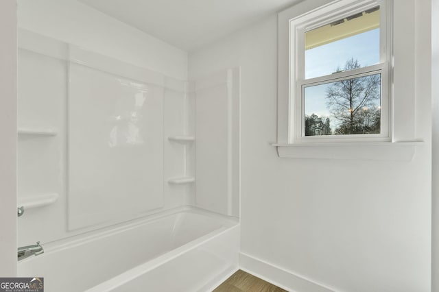 bathroom featuring bathing tub / shower combination