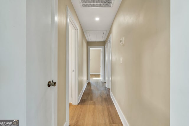 corridor featuring light hardwood / wood-style flooring