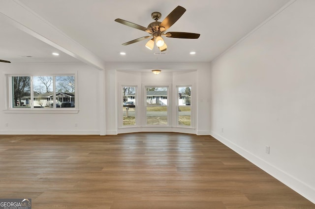 unfurnished living room with hardwood / wood-style flooring and ceiling fan