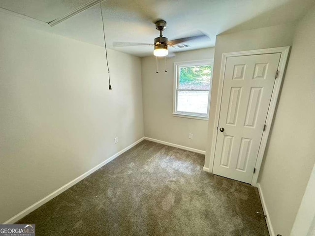 unfurnished room featuring carpet flooring and ceiling fan