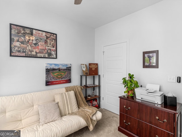 sitting room with light carpet and ceiling fan