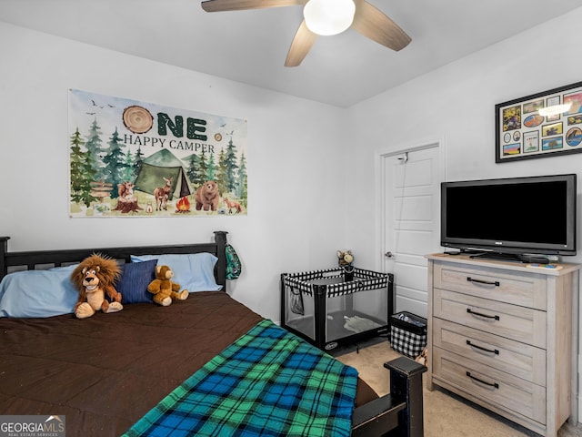 carpeted bedroom featuring ceiling fan