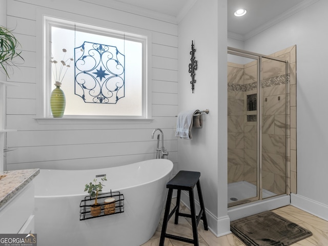 bathroom featuring ornamental molding, plus walk in shower, and plenty of natural light