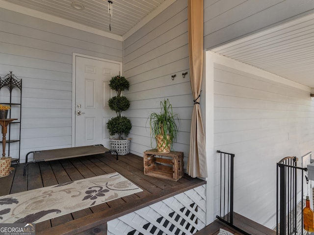 doorway to property with covered porch