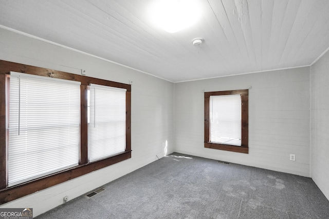 empty room featuring carpet flooring