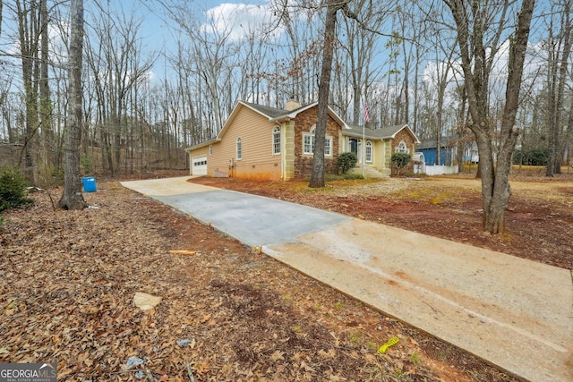 view of side of property featuring a garage