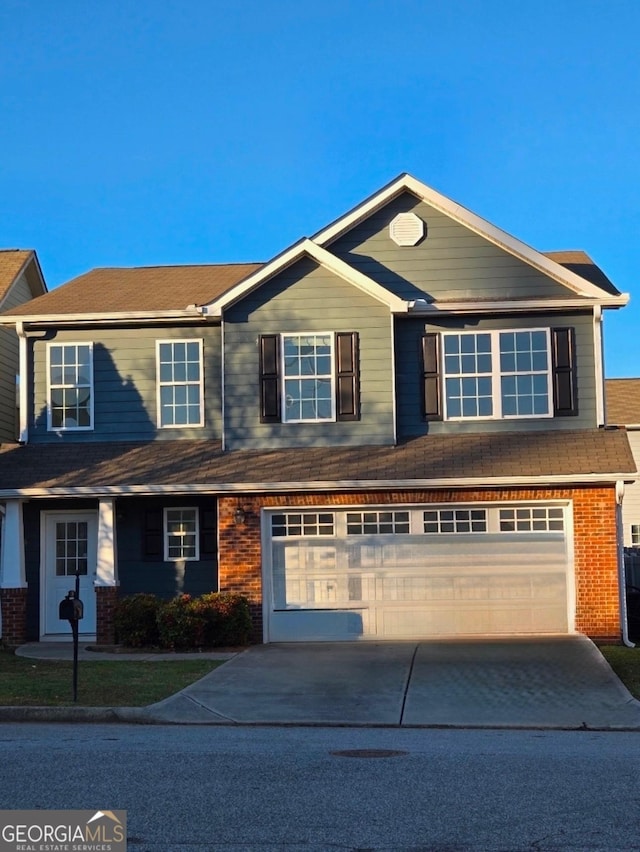 view of front of home with a garage