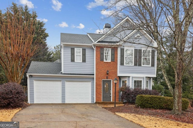 front of property with a garage