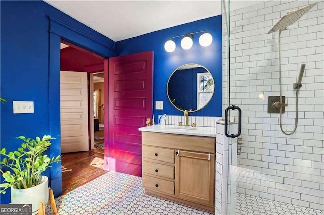 bathroom with vanity and walk in shower