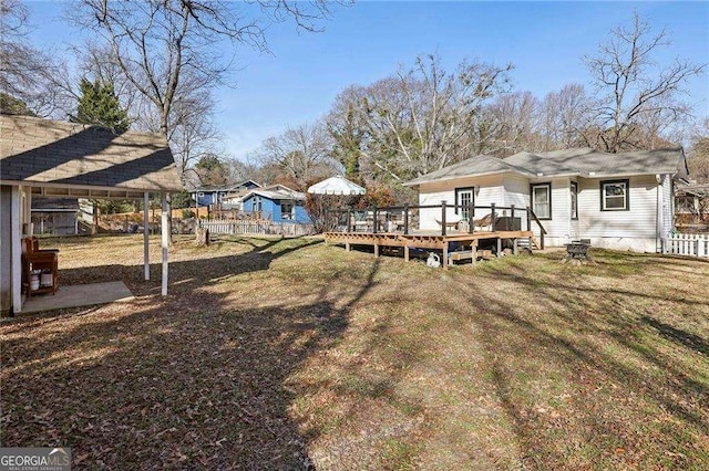 view of yard featuring a deck