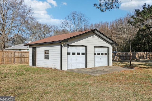 garage with a lawn