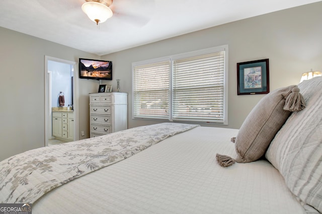 bedroom with ceiling fan and ensuite bathroom