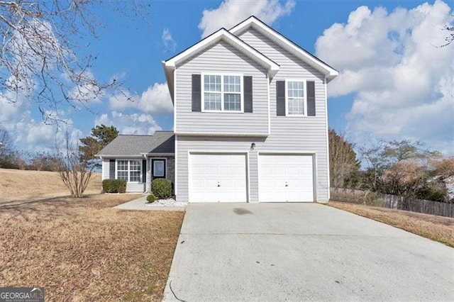 front facade with a garage and a front yard