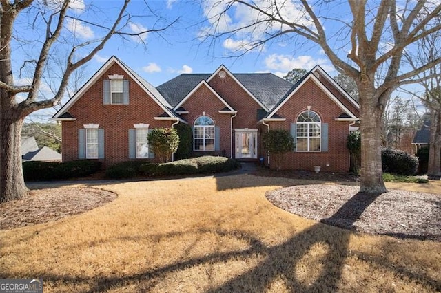 view of property with a front lawn