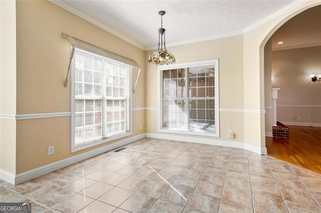 unfurnished dining area with light tile patterned floors and crown molding