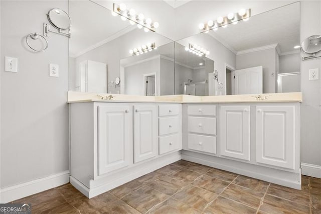 bathroom with ornamental molding, vanity, and walk in shower