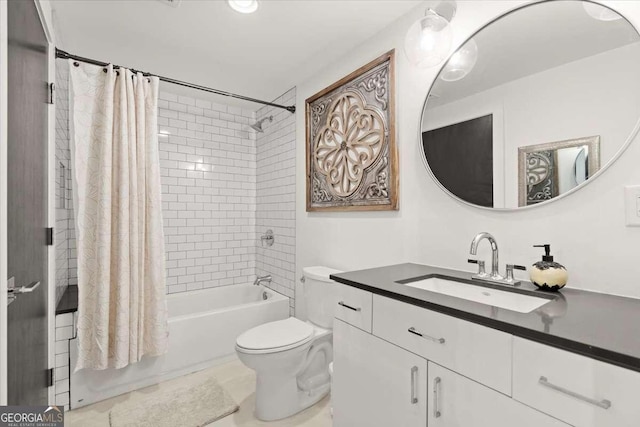 full bathroom with vanity, shower / bath combination with curtain, and toilet