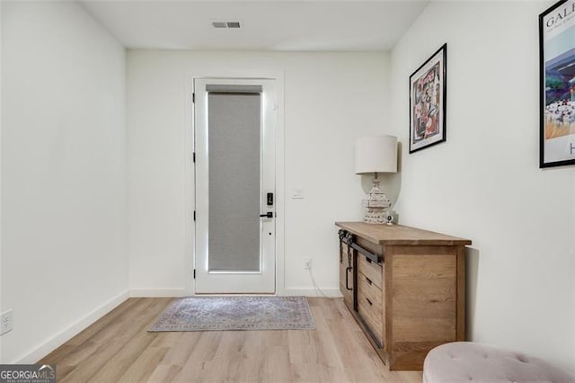 entrance foyer featuring light hardwood / wood-style floors