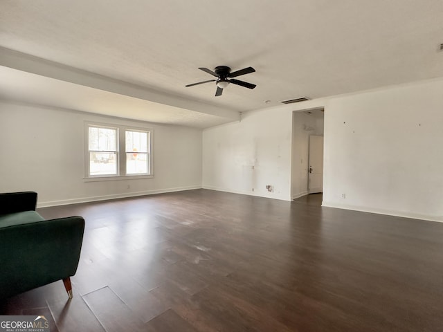 unfurnished living room featuring dark hardwood / wood-style floors and ceiling fan