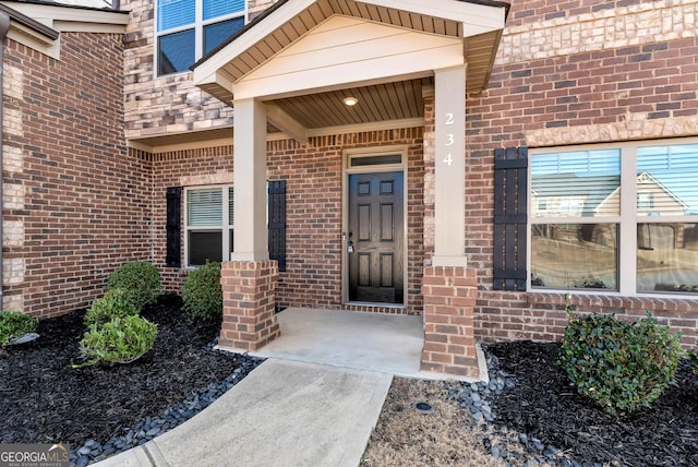 property entrance featuring covered porch