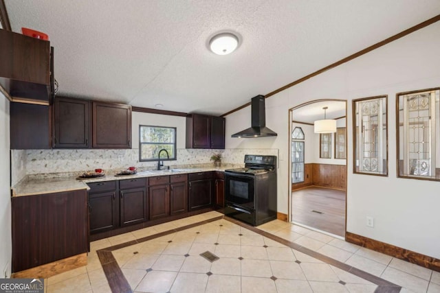 kitchen featuring black range with electric cooktop, wall chimney range hood, sink, and light tile patterned flooring