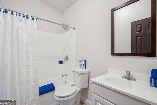 full bathroom with vanity, shower / bathtub combination with curtain, and toilet