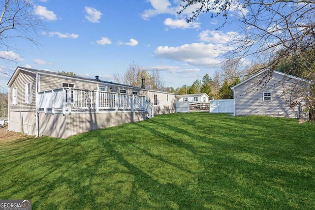 view of yard featuring a deck