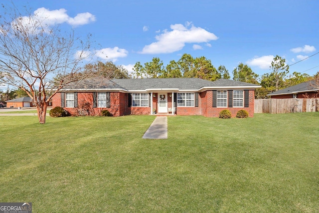 single story home featuring a front lawn