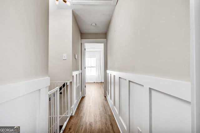 hallway featuring hardwood / wood-style flooring