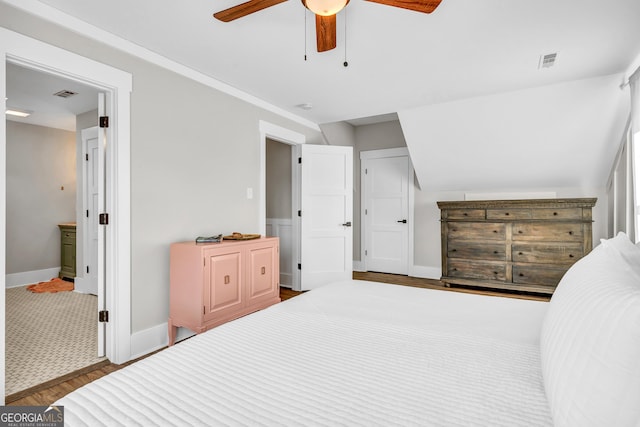 bedroom with hardwood / wood-style flooring and ceiling fan