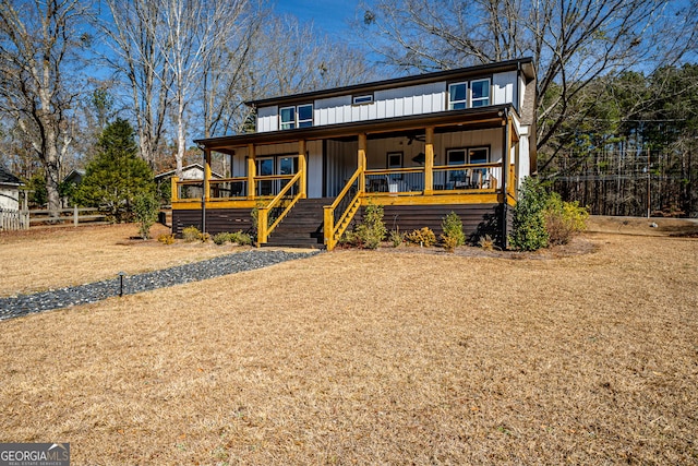 view of front facade with a porch and ceiling fan