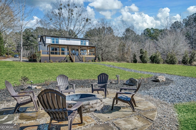 view of patio / terrace with a fire pit