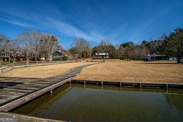 dock area featuring a water view