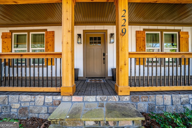 doorway to property featuring a porch