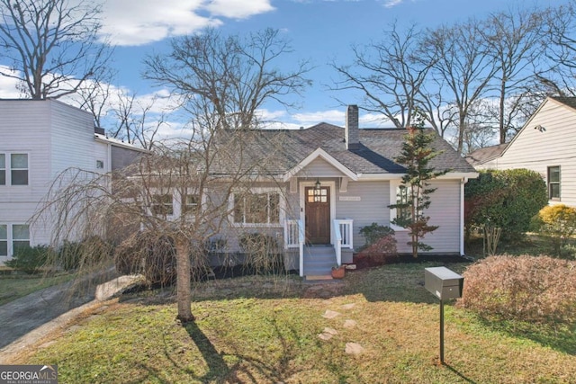 view of front of home with a front yard