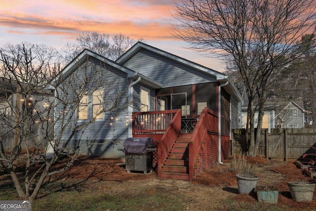 exterior space with a sunroom