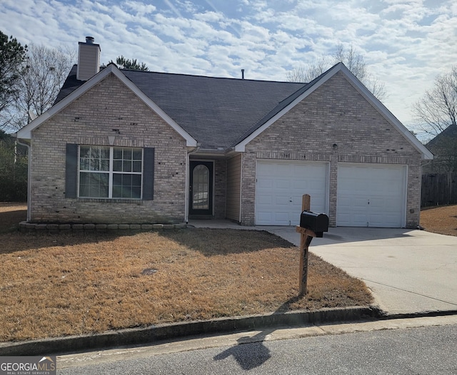 single story home with a garage